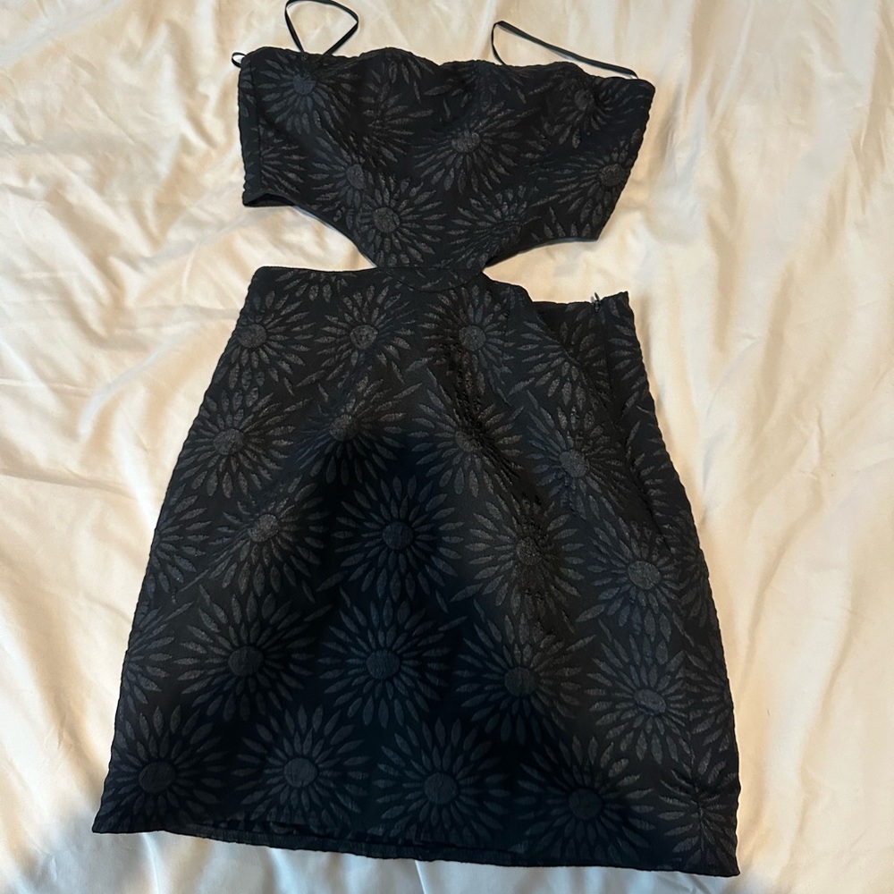 Black Princess Polly strapless mini dress.